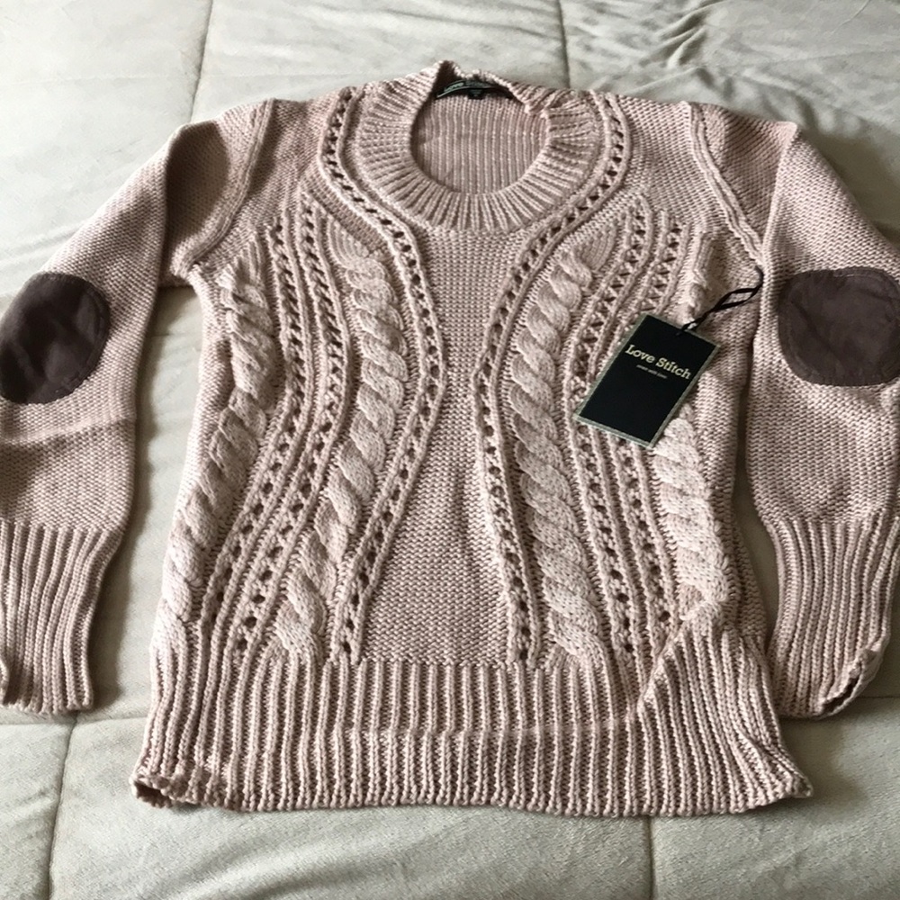 Light sweater never been warm.